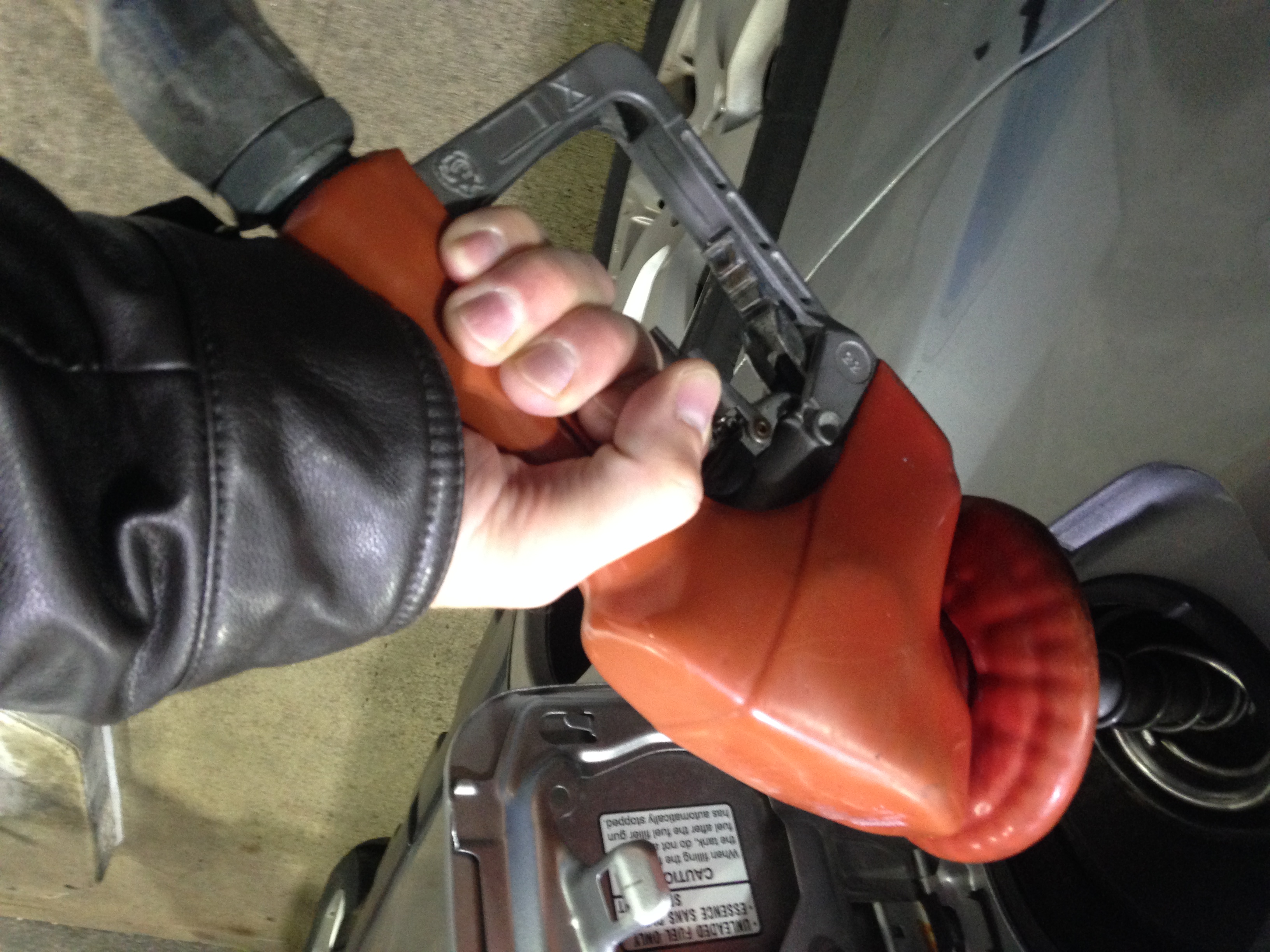 Close-up of a driver fueling their vehicle
