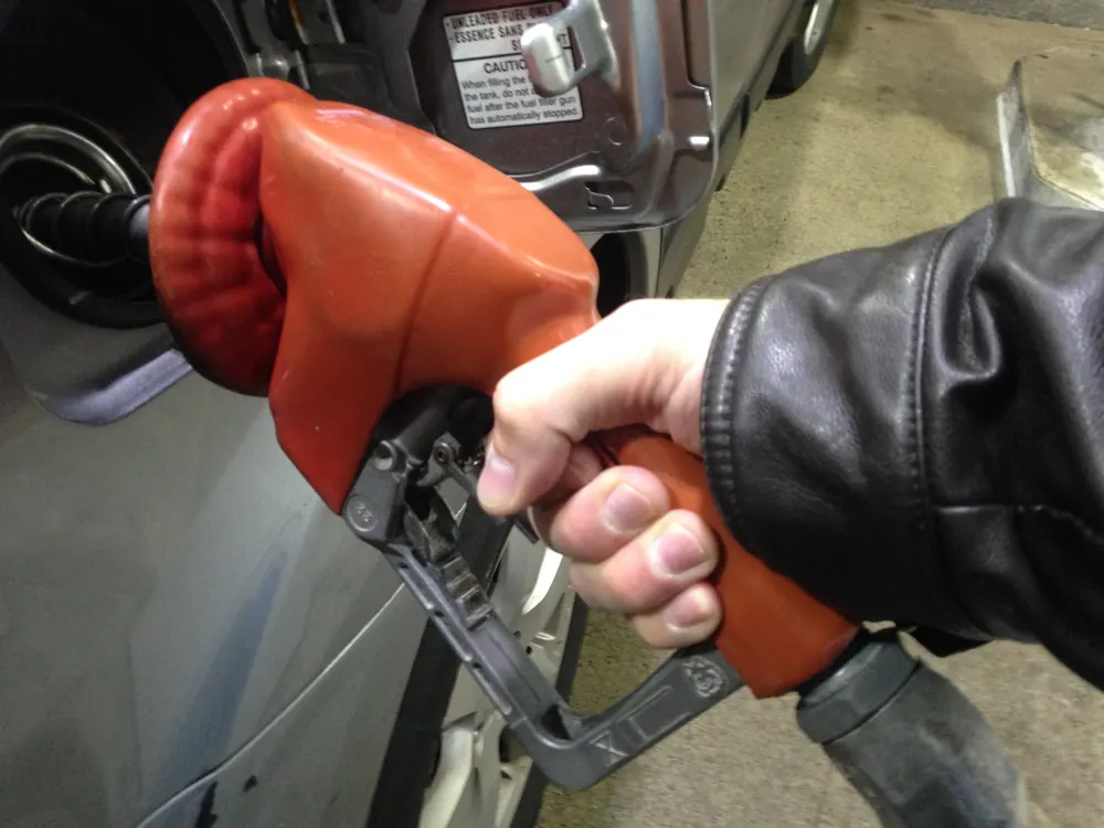 Close-up of a driver fueling their vehicle